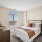 bedroom with bed and large window